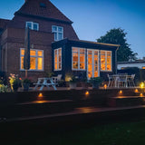 112 m2 terrasse med plantekasser, spanske trapper og lysspots i Vedbæk