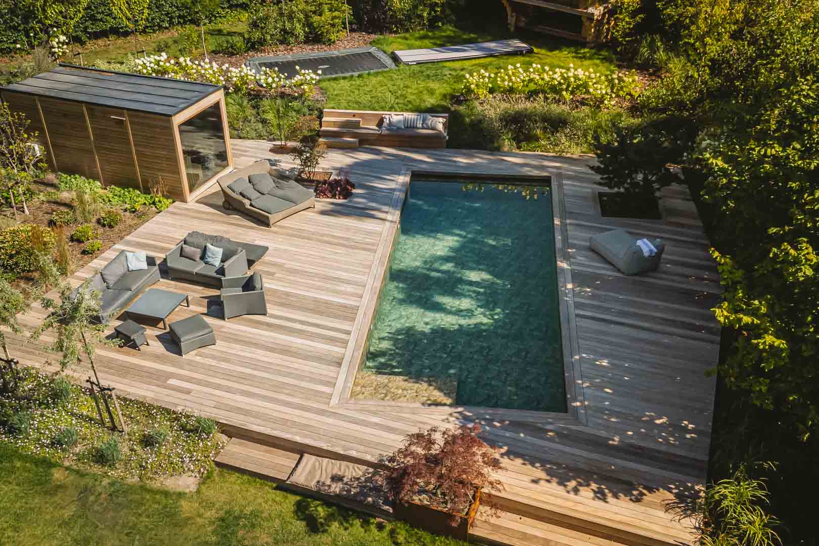 Terrasse med pool og sauna bygget i ipé i Vedbæk