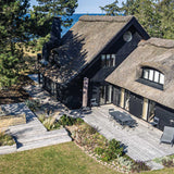 236 m² egetræsterrasse i Nordsjælland med havudsigt