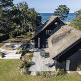 236 m² egetræsterrasse i Nordsjælland med havudsigt